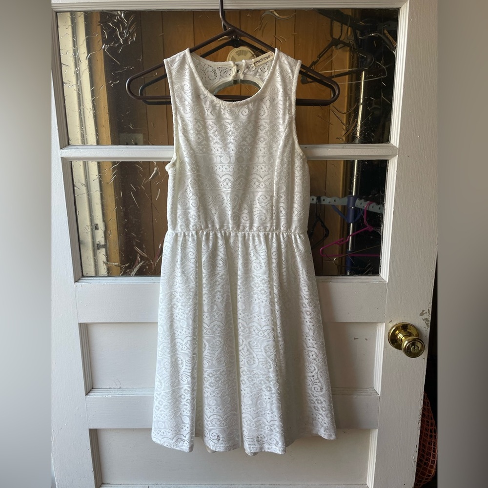 White mini dress with peep hole in the back